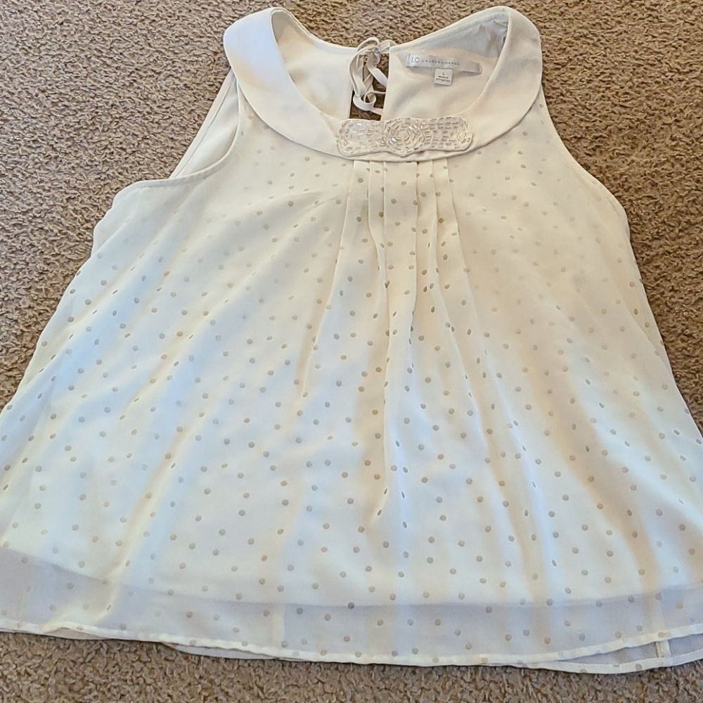 Gold polka dotted tank top with beaded bow.